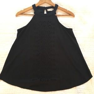 High neck, sleeveless, black tank top